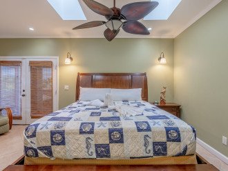 Master Bedroom Suite offers a king bed, private bath, tv & separate entrance to balcony.