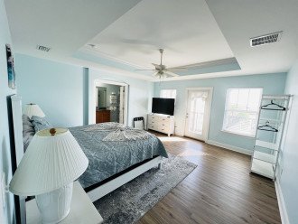 Spacious master suite with balcony
