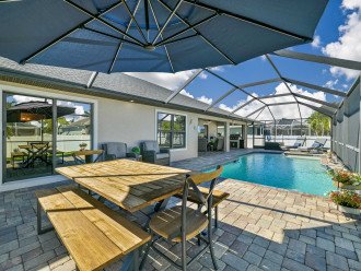 You will be loving the outdoor living at it's best with heated pool, outdoor dining and outdoor kitchen with TV