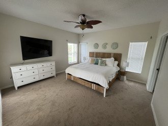 Master bedroom with new King bed and new 65" smart TV
