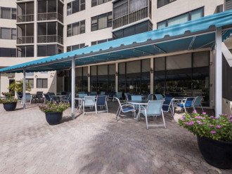 Plenty of outdoor dining on main level by the barbecue grills