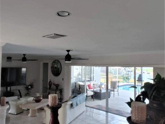 Large Living room , sliding doors to pool. pic #4