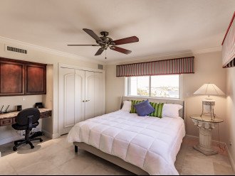 3rd King bedroom with desk area & views of marina