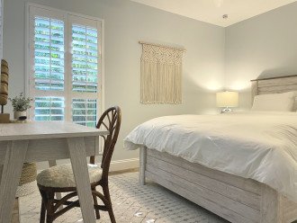 White Sands Bedroom (No. 2) with comfortable queen bed and workspace.
