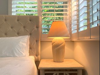 Tropics Bedroom (No. 3) has king bed w/ garden views on second open loft level.