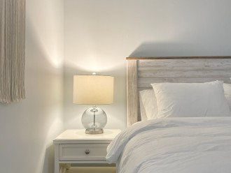 White Sands Bedroom (No. 2) has a queen bed with a desk, closet & luggage rack.