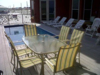 A true gulf front house with a heated balcony pool #1