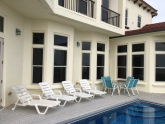 A true gulf front house with a heated balcony pool #1