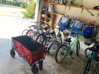 Bikes, beach chairs, umbrella and beach wagon