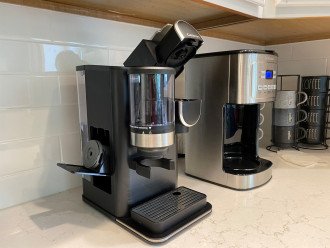 Well equipped coffee station with single serve keurig and 14 cup Cuisinart drip coffee maker