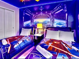 An eye popping Star Wars themed twin bedroom