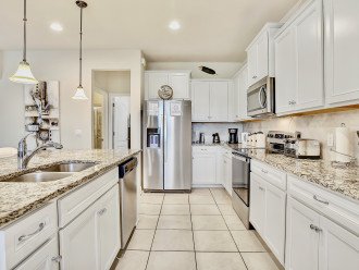 A fully equipped kitchen with all utensils and appliances that you could need