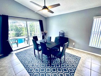 A more formal dining area, with direct access to the pool and deck space
