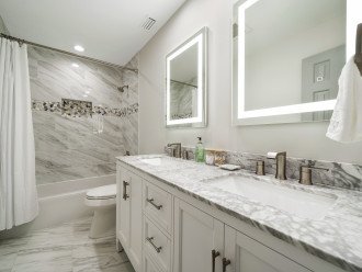 Master bath with tub and shower and dual sink
