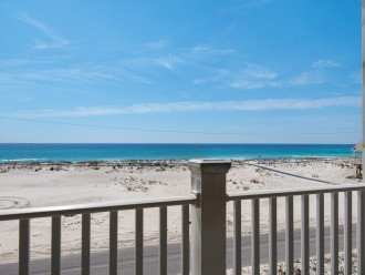 Relax and enjoy watching your kids at the beach from our front porch