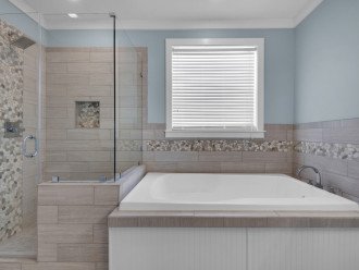 Master Bathroom, large garden tub, frameless glass shower, shower bench