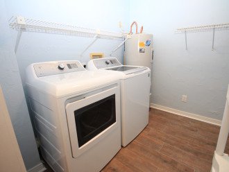 Laundry area with HE washer and Dryer
