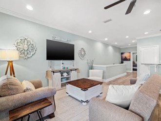 Living Room with 65" Flat Screen Roku TV