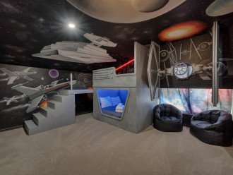 Intricate, hand painted murals and a stairway to one sleeping pod as well as the bridge to the TIE Fighter cockpit