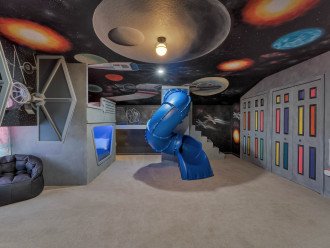 Stairs to the other sleeping pod and TIE Fighter cockpit as well as the entrance to the swirly slide