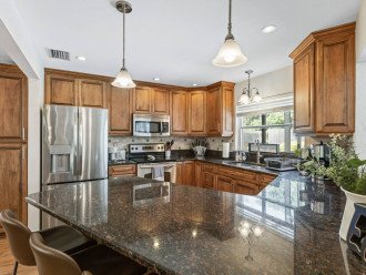 Beautiful kitchen with stainless steel appliances.
