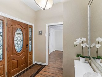 Foyer greets you with a nice large mirror and console table so you can look at yourself as you come in and go out for any last minute touch ups.