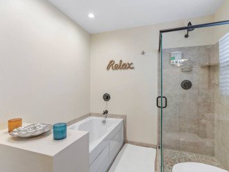 Bathroom 1 - Jetted bathtub, glass door tile shower.