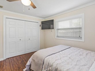 Bedroom 2 - features a large Roku smart TV, watch in bed and relax! Huge closet to store extra belongings.