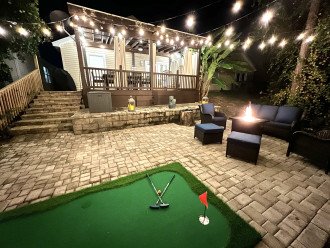 Our private string-lit backyard is perfect for evening fun.