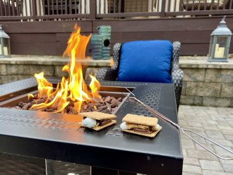 Enjoy some s'mores around the fire in your private backyard sanctuary.
