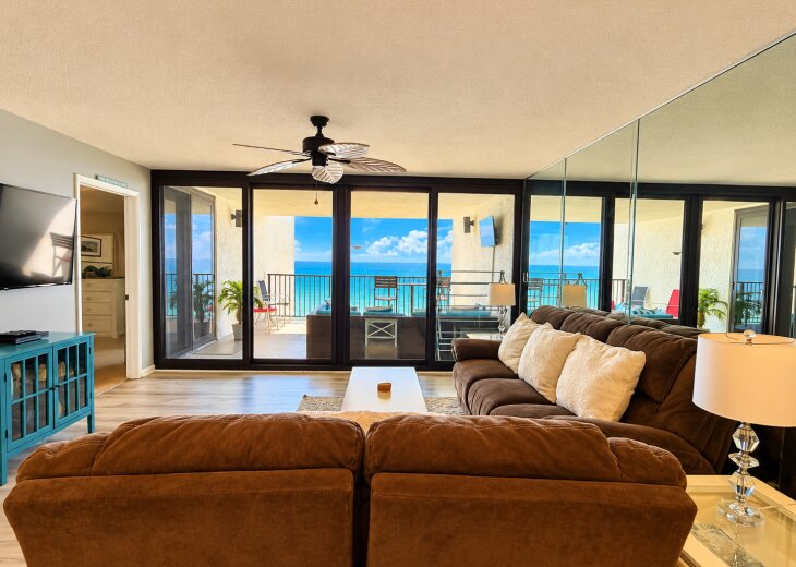 Spacious, comfortable seating with floor-to-ceiling windows and beautiful Gulf views.