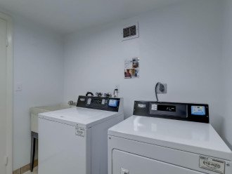Washer and dryer located rt across unit