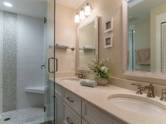 Ensuite Master Bathroom with Shower and 2 sinks. Beautifully decorated! Super soft Towels.