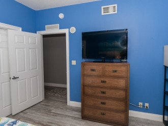 Front Bedroom with Large LCD Smart TV