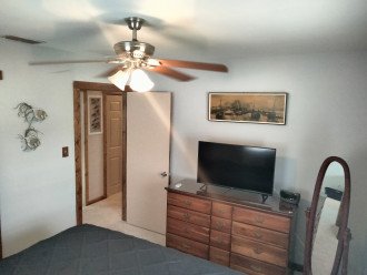 Second bedroom with adjustable king bed and 40" tv