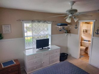 Master bedroom with 1/2 bath and 35"TV