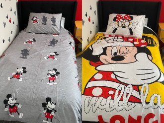Choose between Mickey or Minnie duvet covers in our mouse themed bedroom.