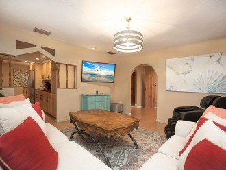 Enjoy family time in this cozy living room! Watch a family favorite movie on the 60in TV while mom/dad/grandma/grandpa get a massage.