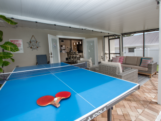 Full size ping pong table in the covered patio