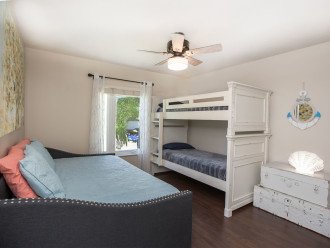 Kids LOVE this room! Twin size bunk beds; Full size daybed; and twin size trundle. This room will fit 4-5 kids or teens!