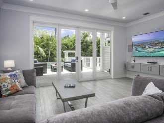 Comfy couch with outdoor views and open concept entertaining