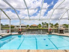 Heated Infinity Pool, Gulf Access, Pool table, sleeps 22 - Cape Coral Dolphins