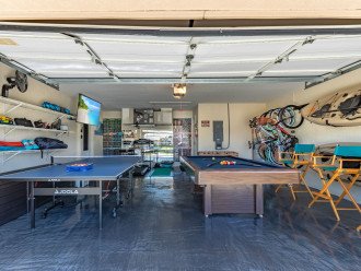 AIRCONDITIONED GARAGE, GAME ROOM, GYM (billiards, fussball and ping pong tables, kayaks, bikes, beach and fishing gear treadmill, weight bench, and weights)