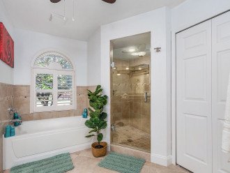 EN-SUITE MASTER BATHROOM (jacuzzi tub, oversized walk-in shower, separate toilet room, double vanity sink)