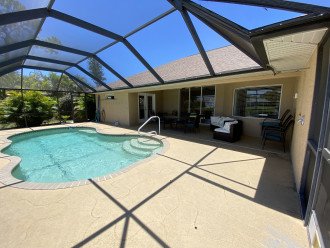 Pool with access from master, living room, and guest side