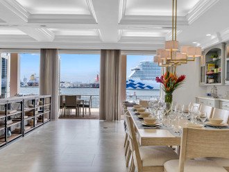 The dining room comfortably seating ten features incredible views of the inlet.
