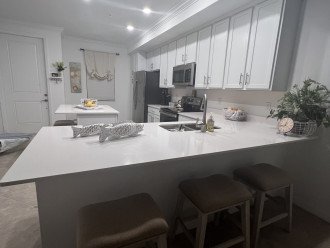 Kitchen w/extended counter and stools