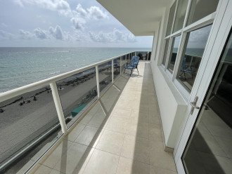 Ocean view of the entire east facing balcony stretch (there is more furniture)