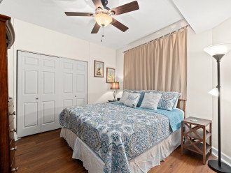 Master bedroom has a king size bed