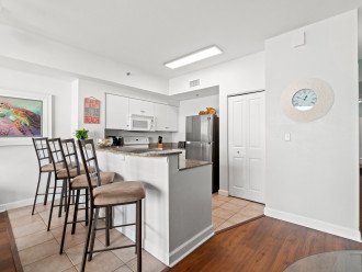 Enjoy entertaining in the spacious kitchen while sitting at the bar that seats 4